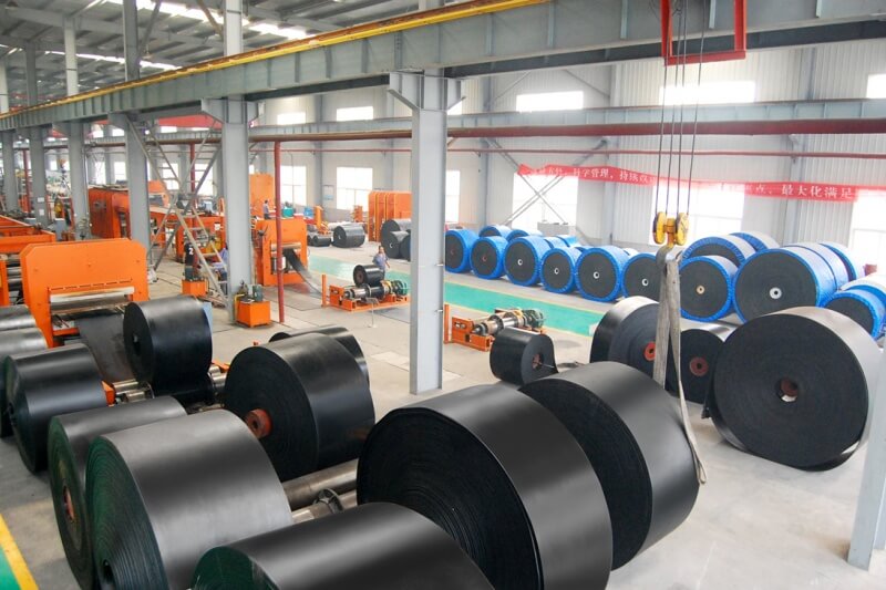 Conveyor belt rolls in production workshop at rubber conveyor belt factory
