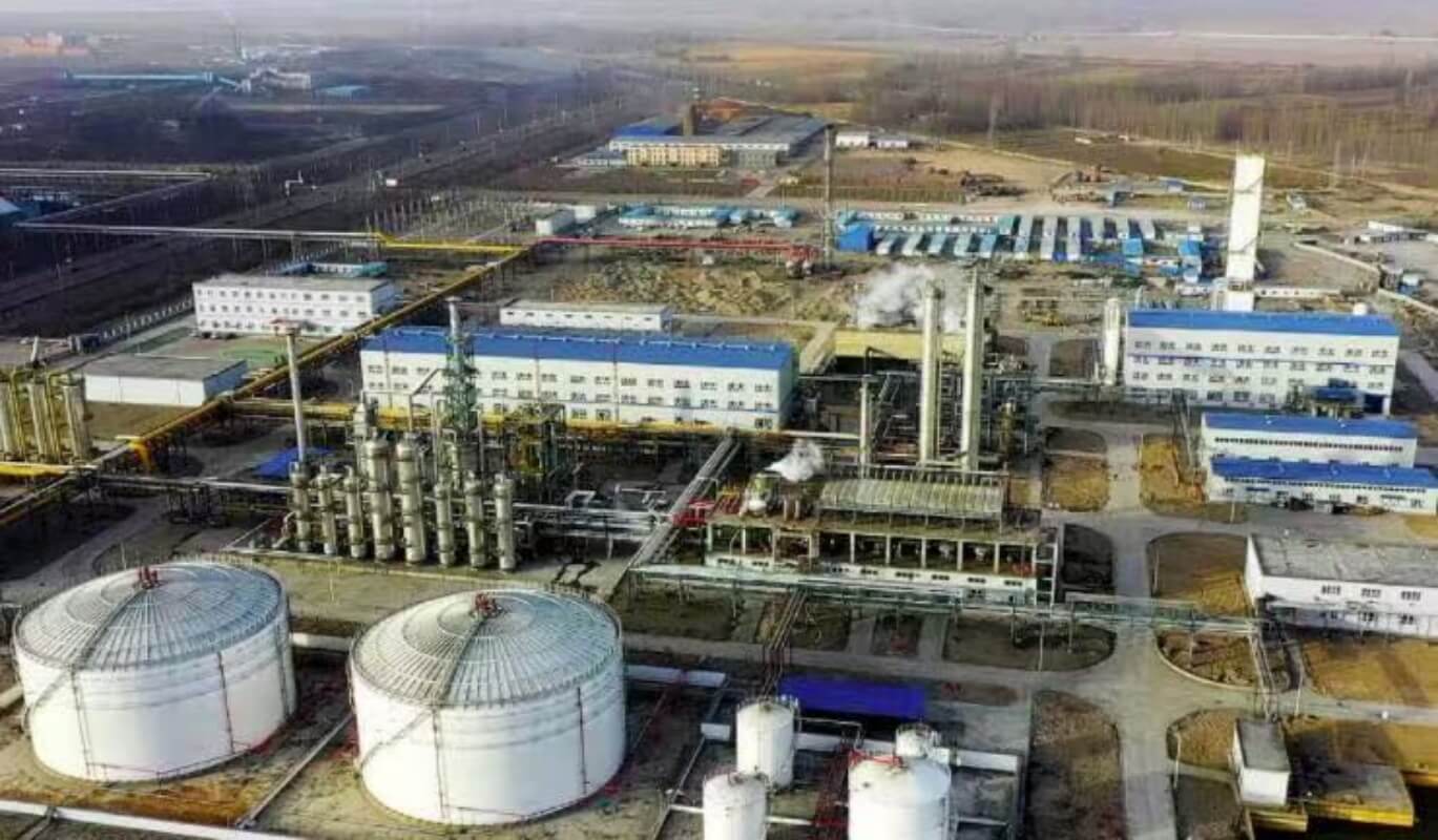 Pipe conveyor belt system used in industrial power plant and energy facility for enclosed bulk material transport