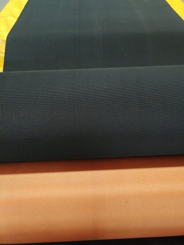 Rough top conveyor belt with anti slip textured surface and bare back fabric construction