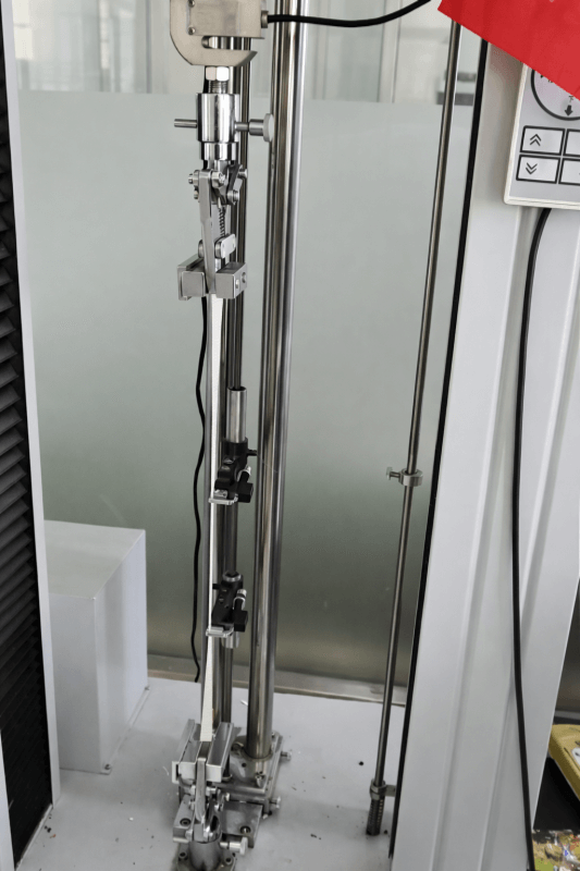 White conveyor belt tensile strength testing machine in laboratory