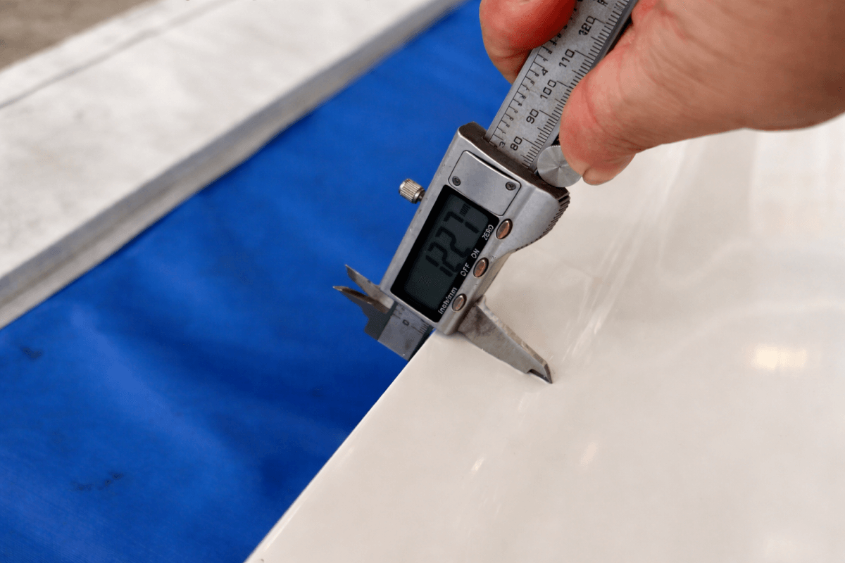 White conveyor belt thickness measurement using digital caliper